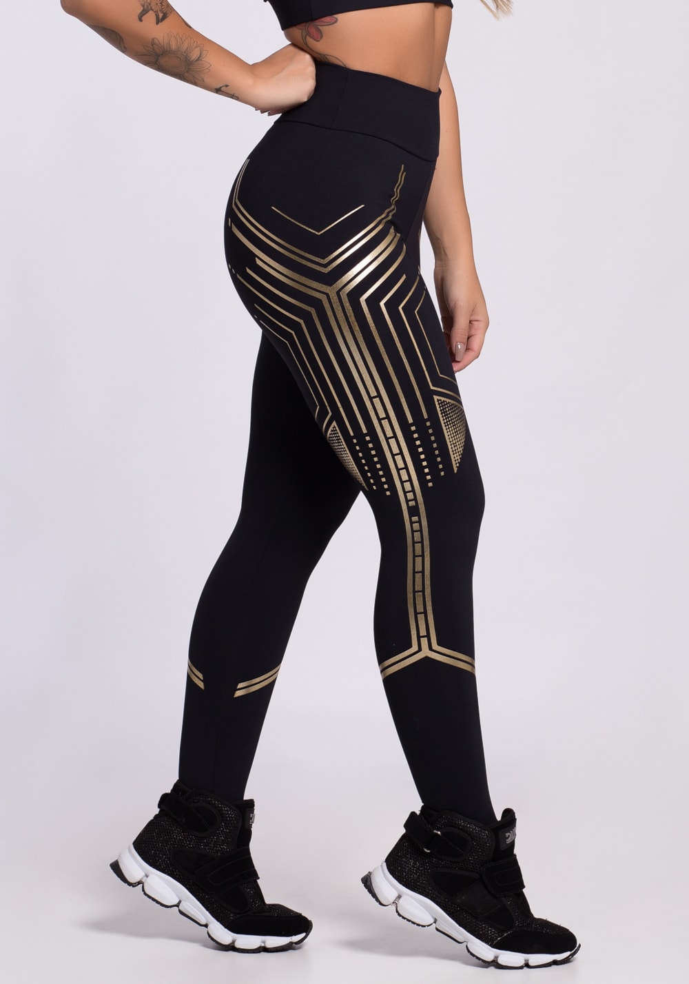 Calça legging preta com silk dourado