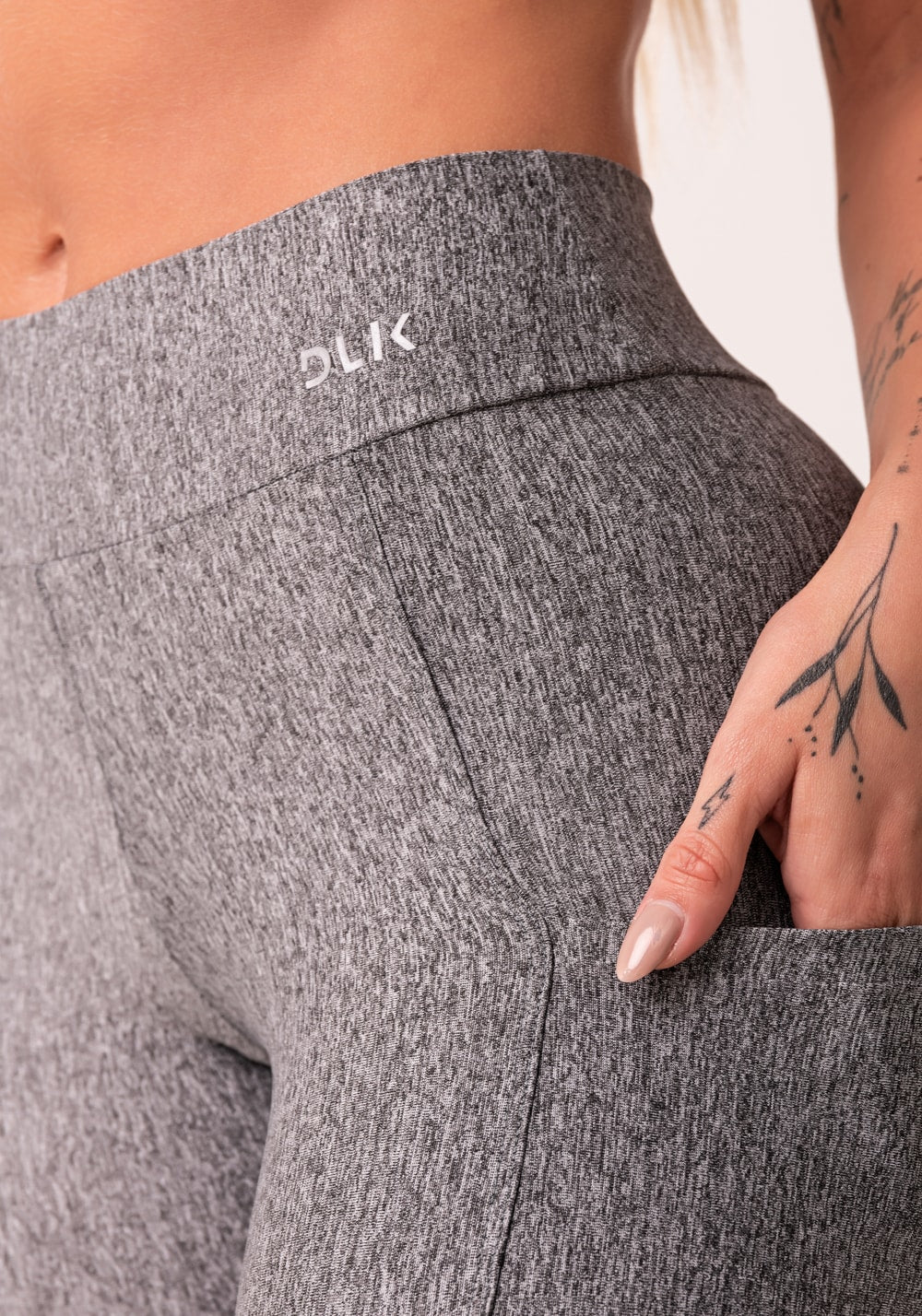 Calça legging mescla com bolso básica