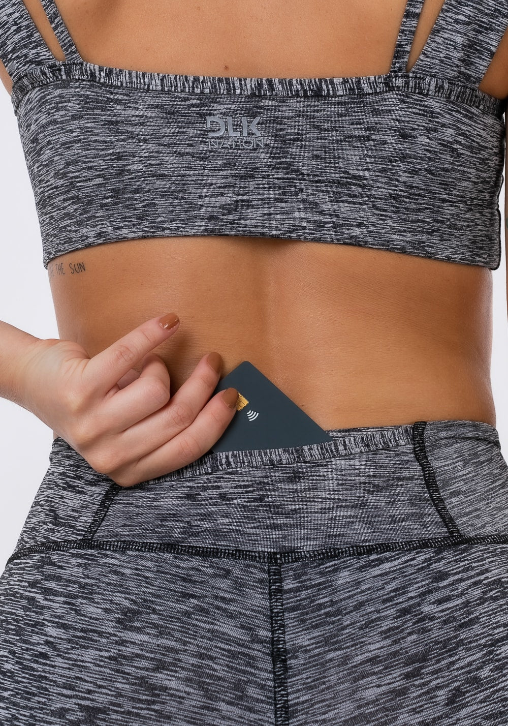 Calça corsário nation com bolso no cós mescla