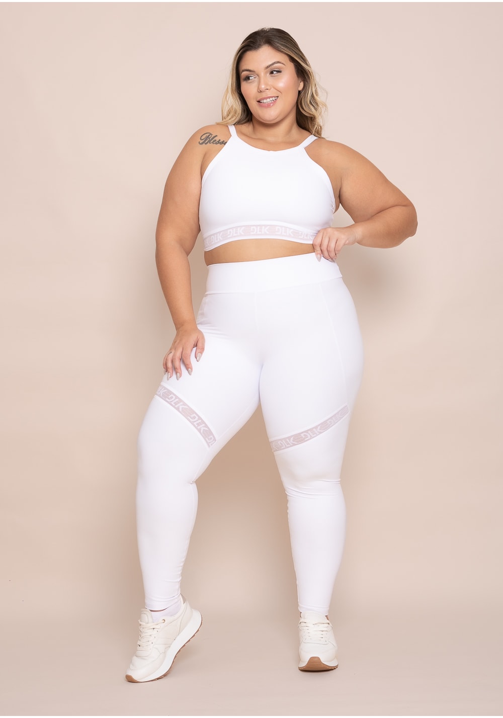 Legging fitness feminina branca com recorte e elástico vazado action