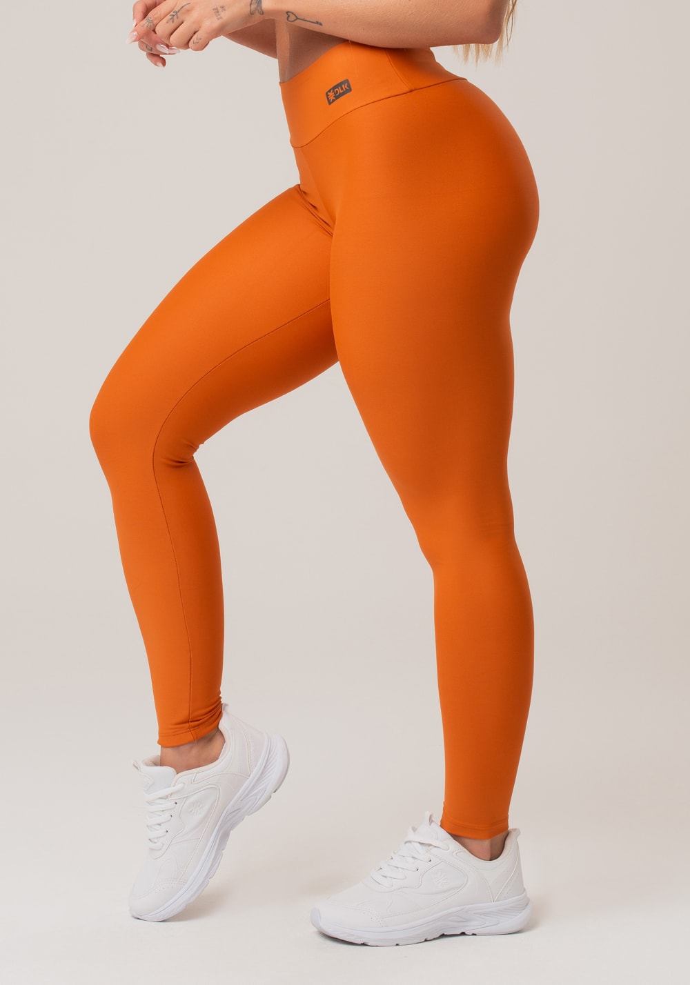 Legging fitness feminina laranja action