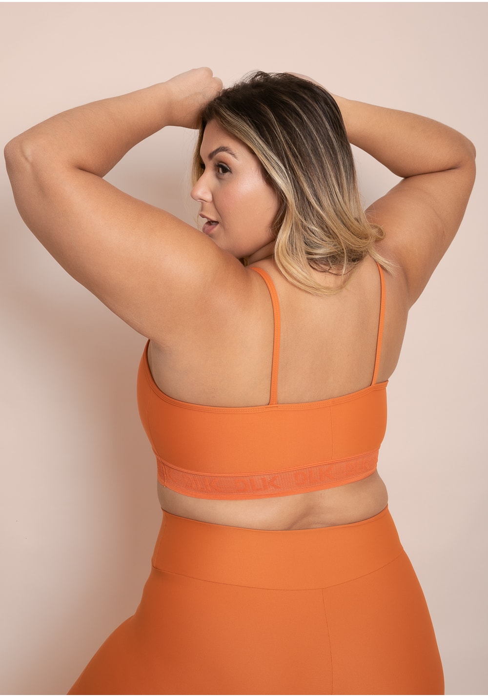 Top fitness feminino laranja com bojo elástico vazado action