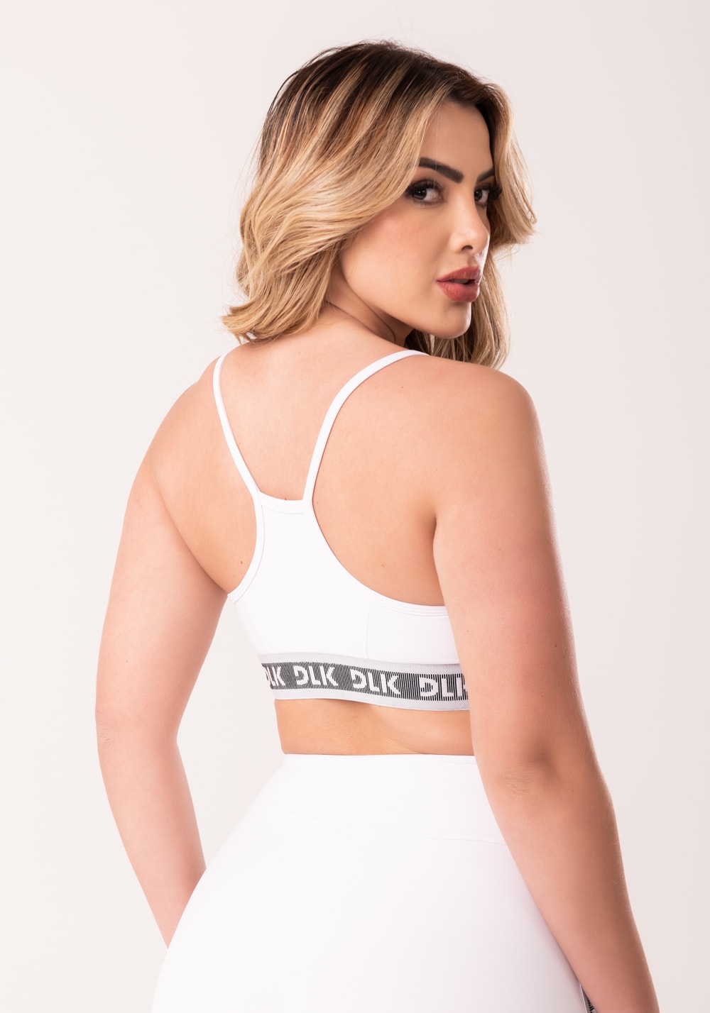 Top fitness feminino branco com bojo e elástico canelado intense