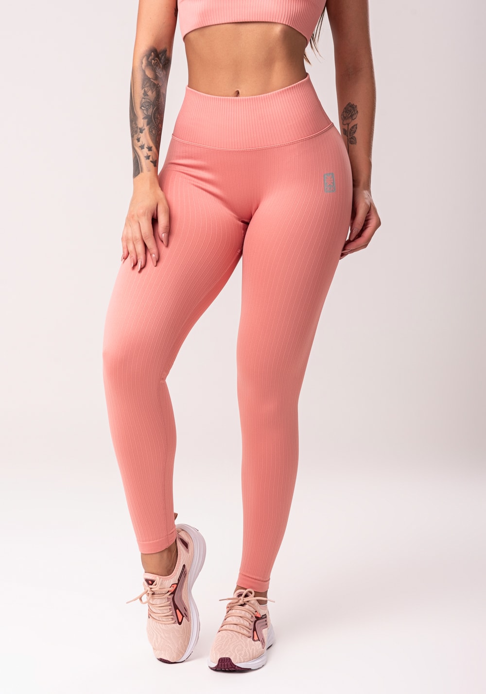 Legging fitness feminina rosé com cós alto e detalhe em v seamless
