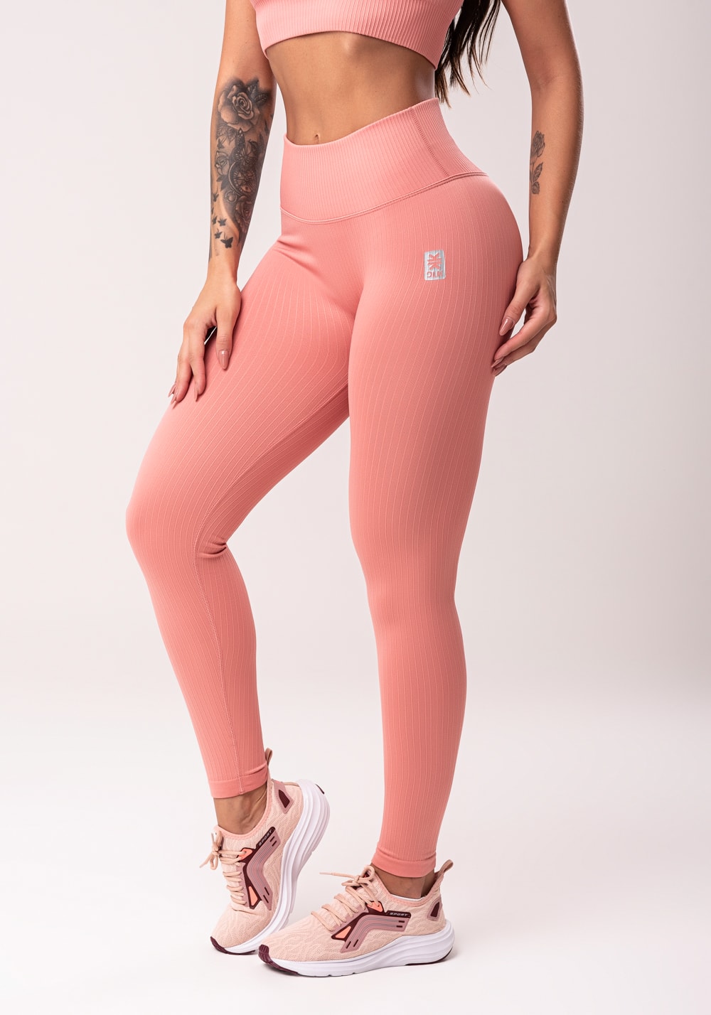 Legging fitness feminina rosé com cós alto e detalhe em v seamless