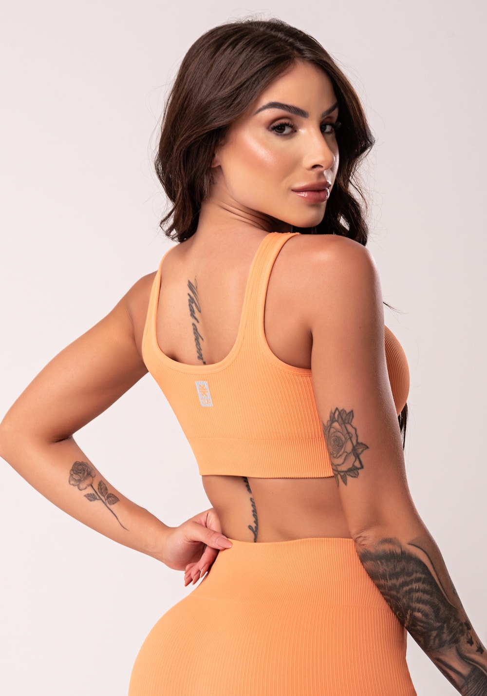 Top fitness feminino laranja texturizado com bojo seamless