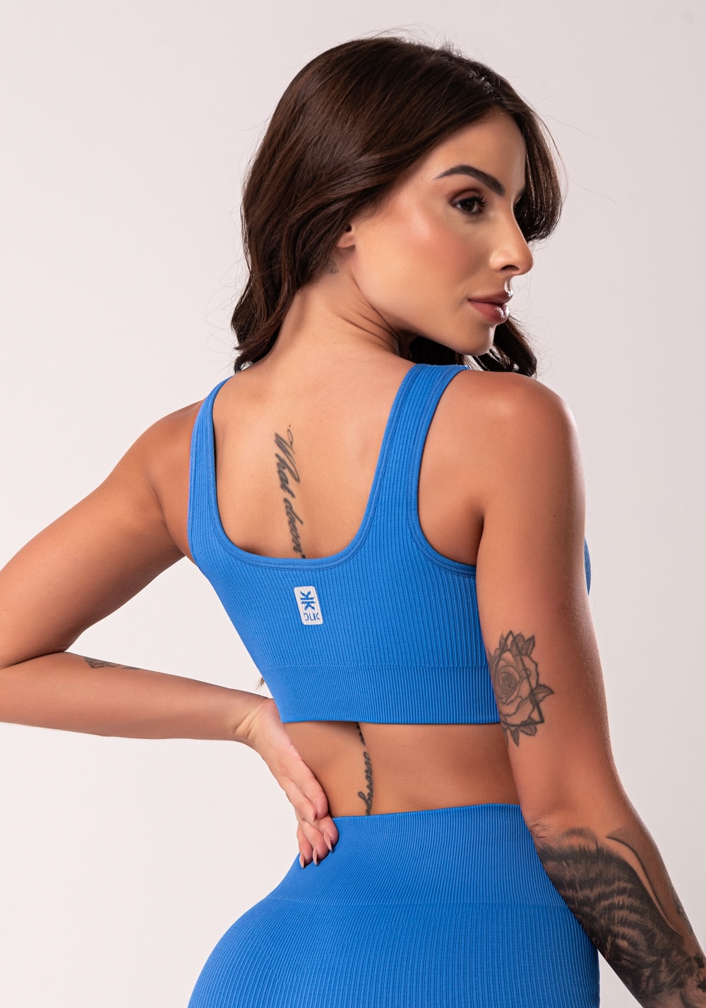 Top fitness feminino azul texturizado com bojo seamless