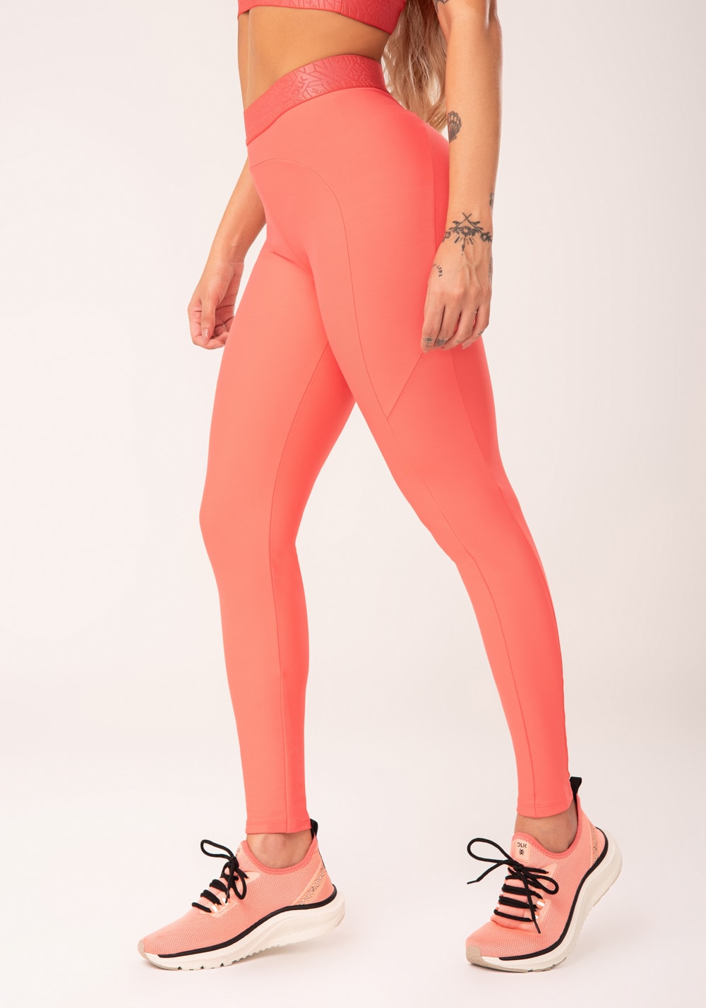 Legging fitness feminina coral com recortes e elástico na cintura flow