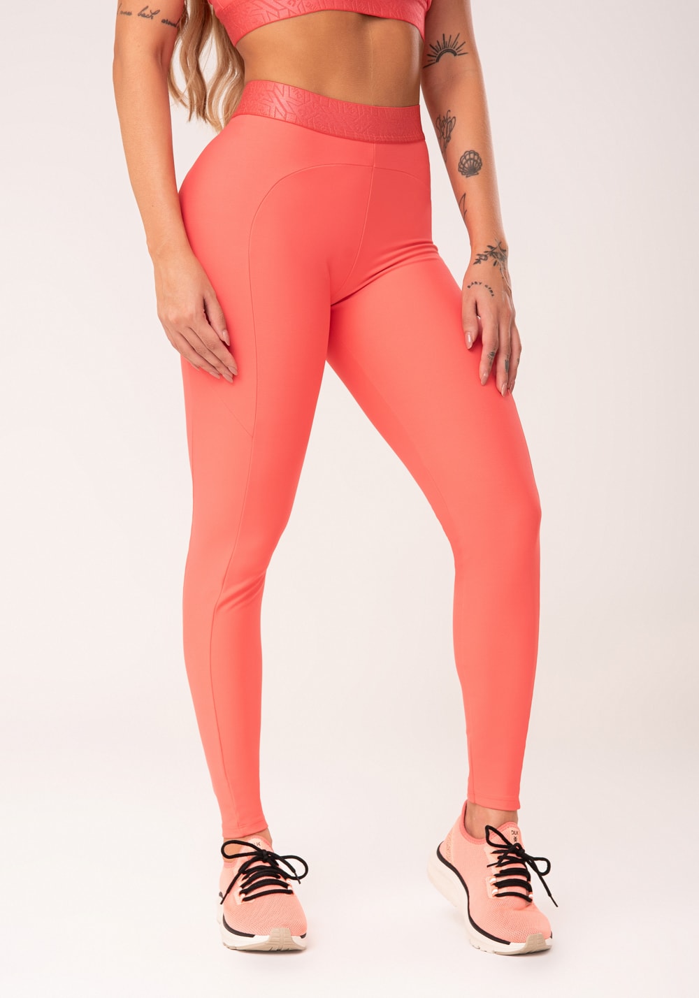 Legging fitness feminina coral com recortes e elástico na cintura flow