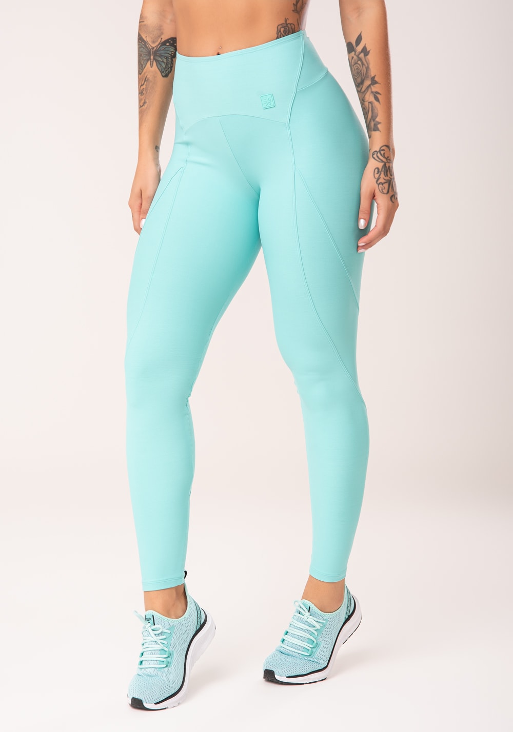 Legging fitness feminina verde com recortes e pesponto flow