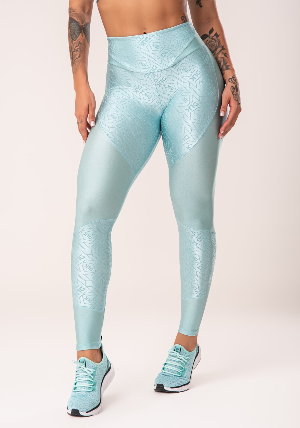 Legging fitness feminina verde com recortes e logomania flow