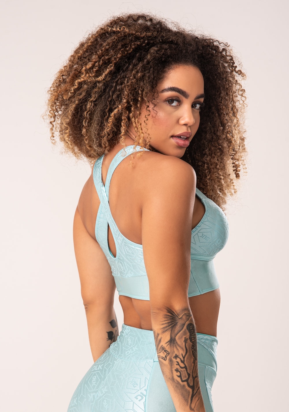 Top fitness feminino verde costas cruzadas flow