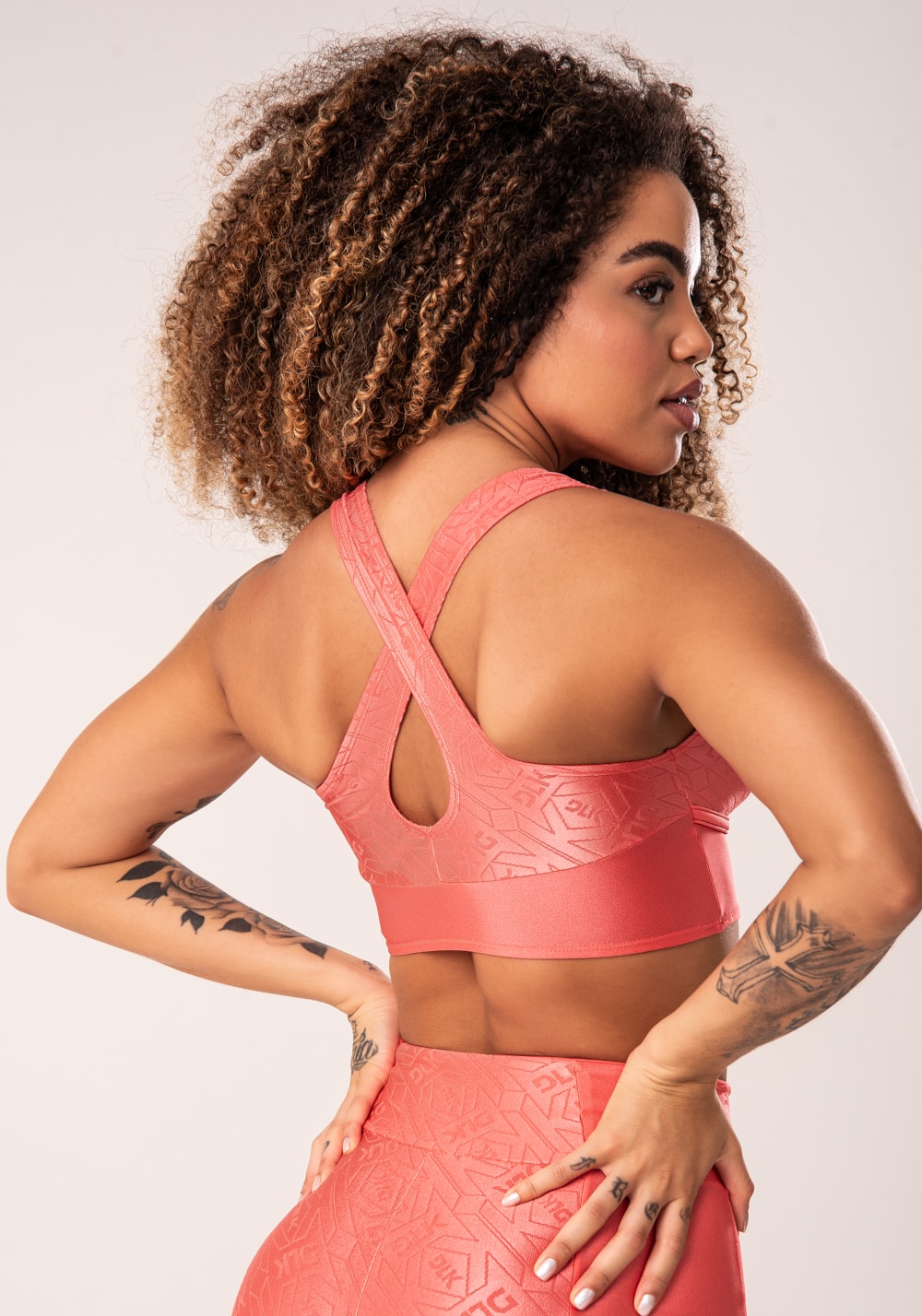 Top fitness feminino coral costas cruzadas flow