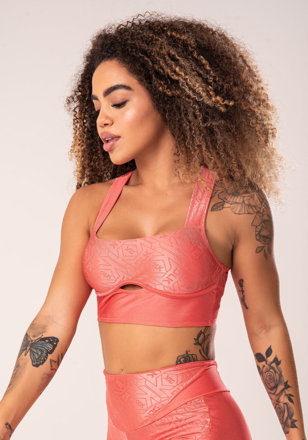 Top fitness feminino coral costas cruzadas flow