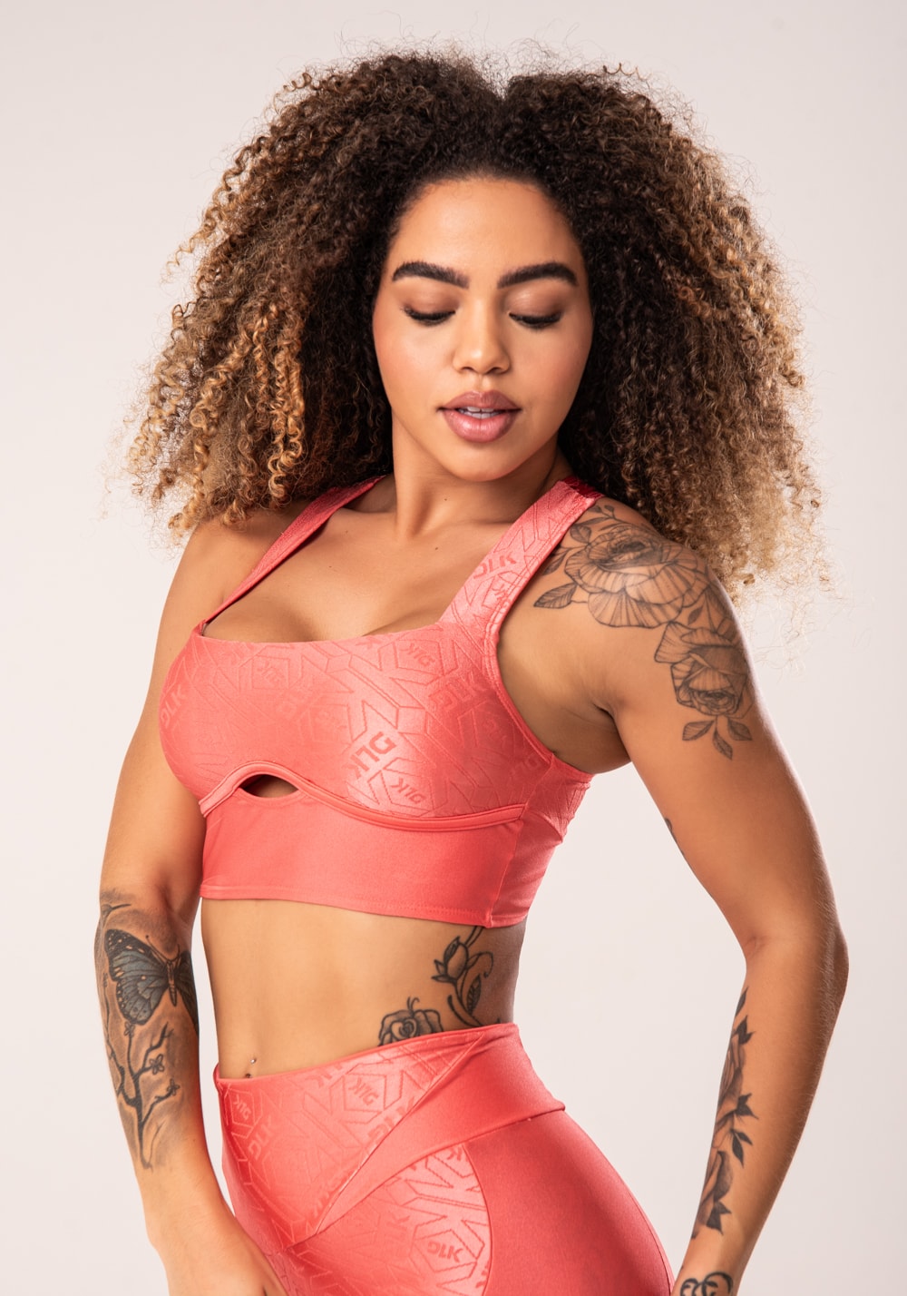 Top fitness feminino coral costas cruzadas flow