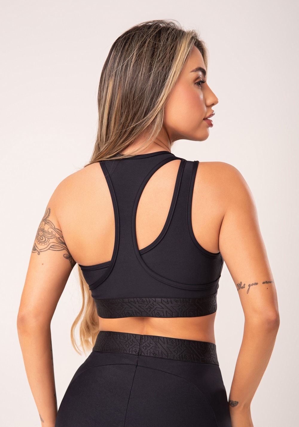 Top fitness feminino preto assimétrico com elástico flow