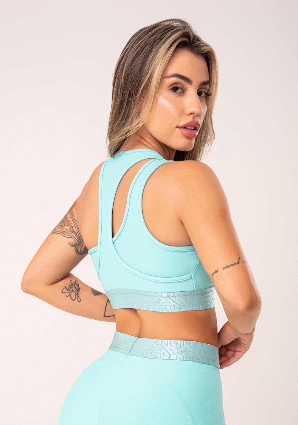 Top fitness feminino verde assimétrico com elástico flow