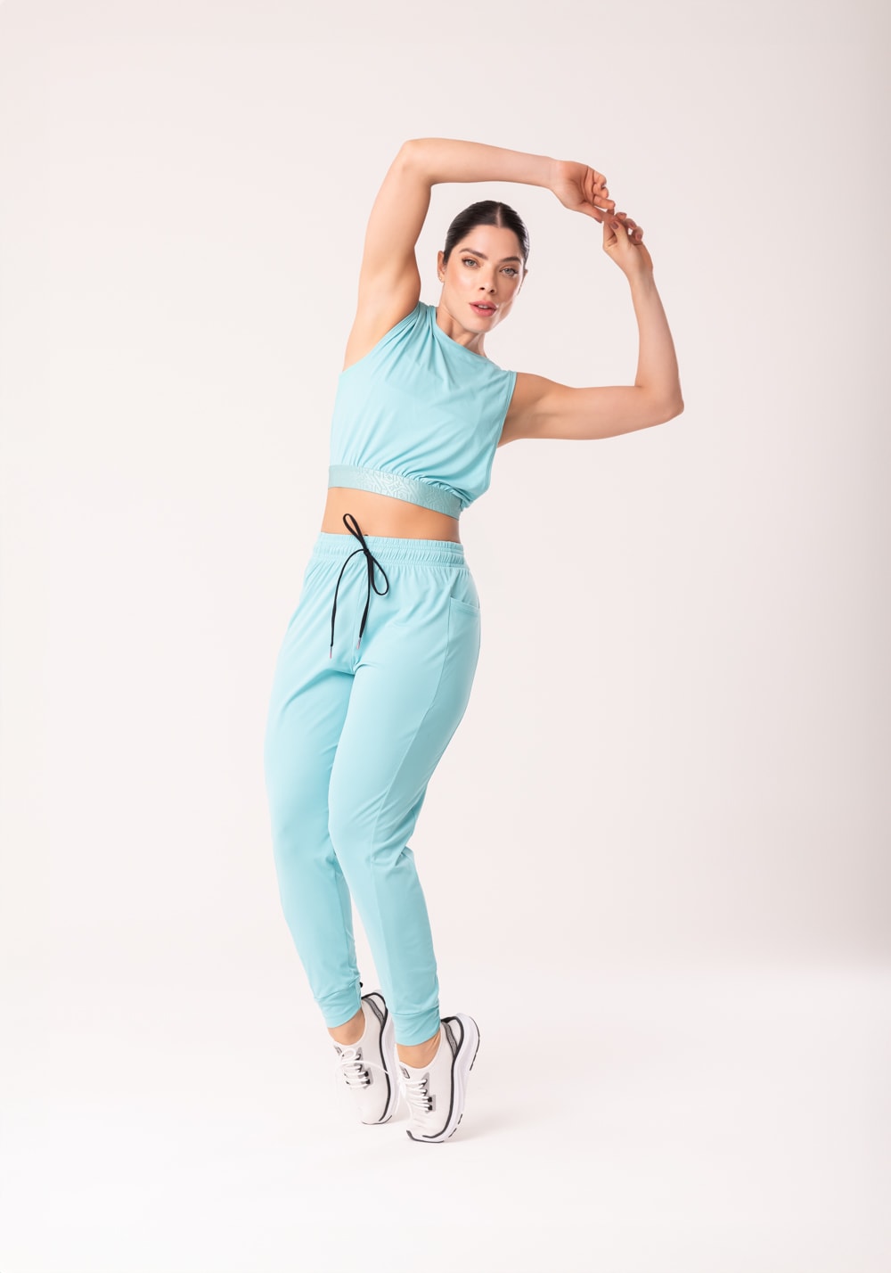 Calça jogger feminina verde com bolso flow