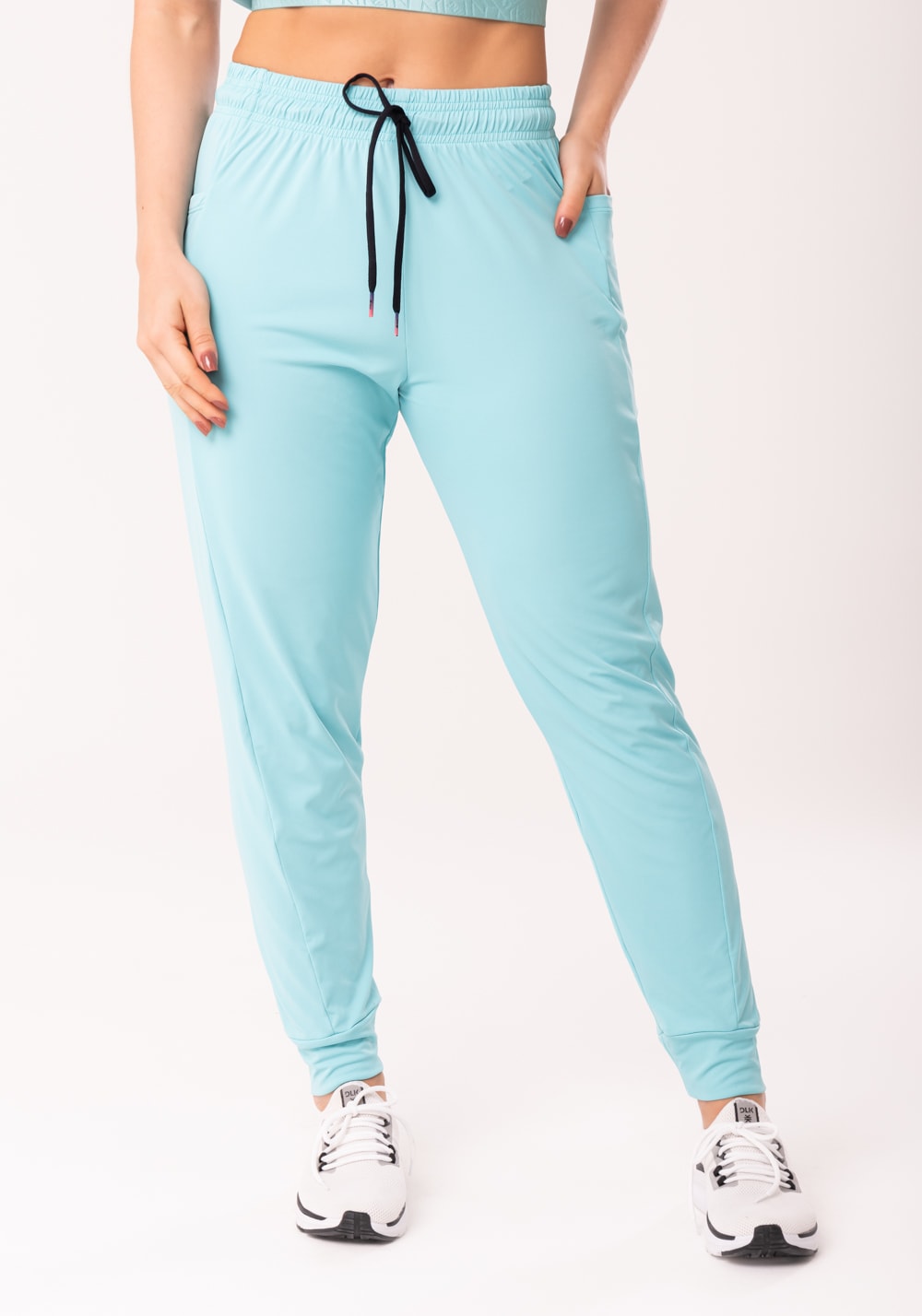 Calça jogger feminina verde com bolso flow