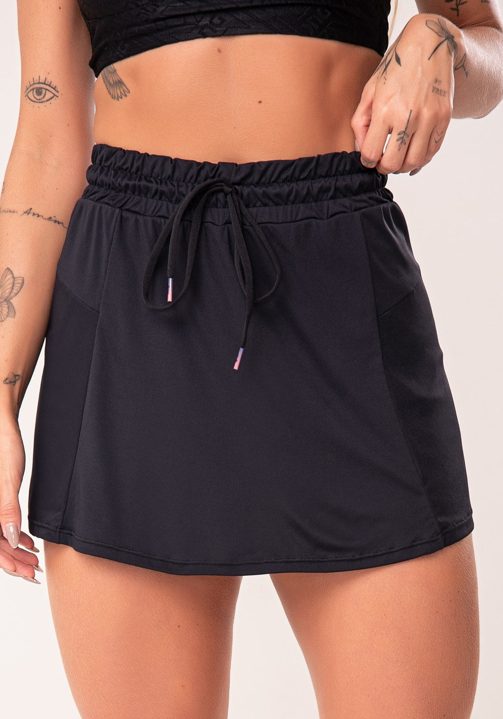 Short saia feminino preto com cadarço flow