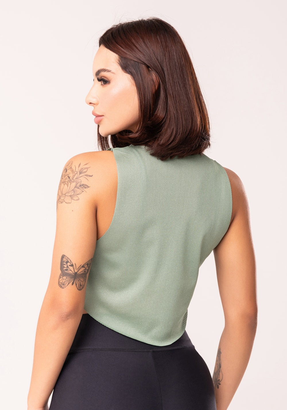 Cropped fitness feminino de tela verde