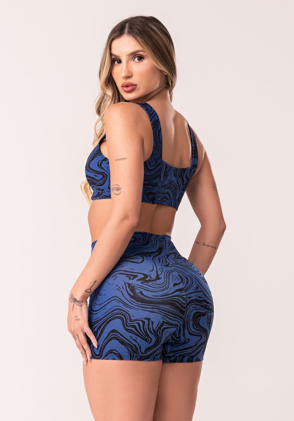 Conjunto fitness feminino azul top e short estampa abstract duo euphoria