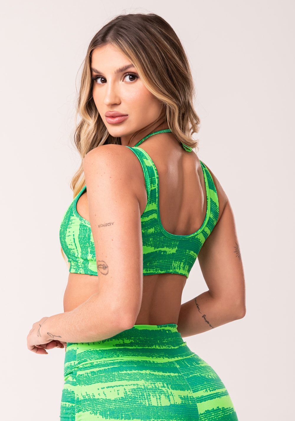 Top fitness feminino verde com franzido estampado disruption euphoria