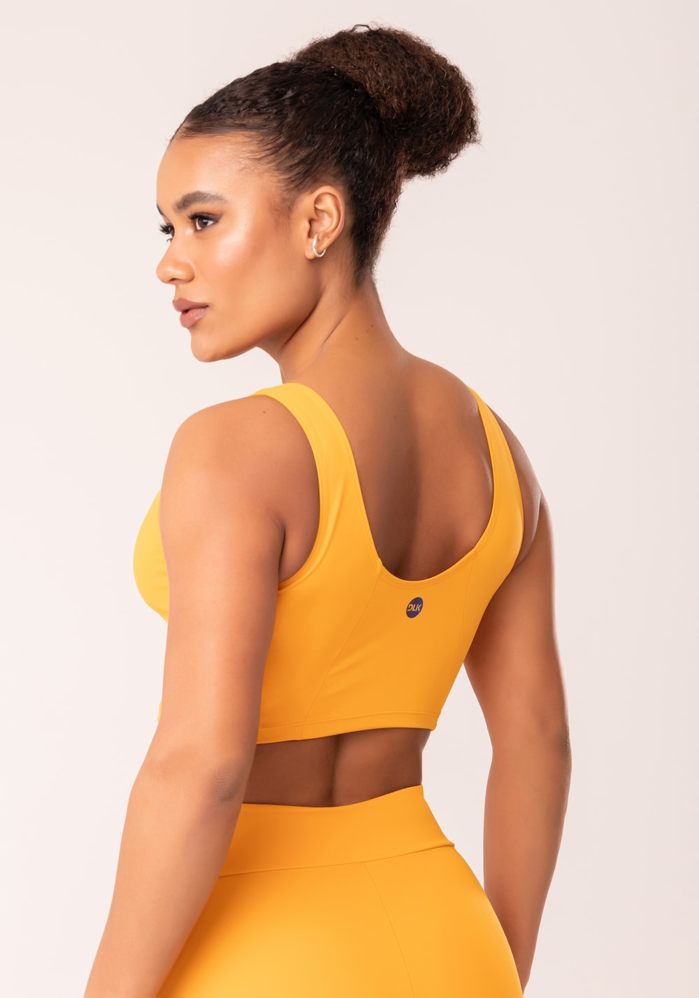 Top cropped fitness feminino amarelo com recortes oasis