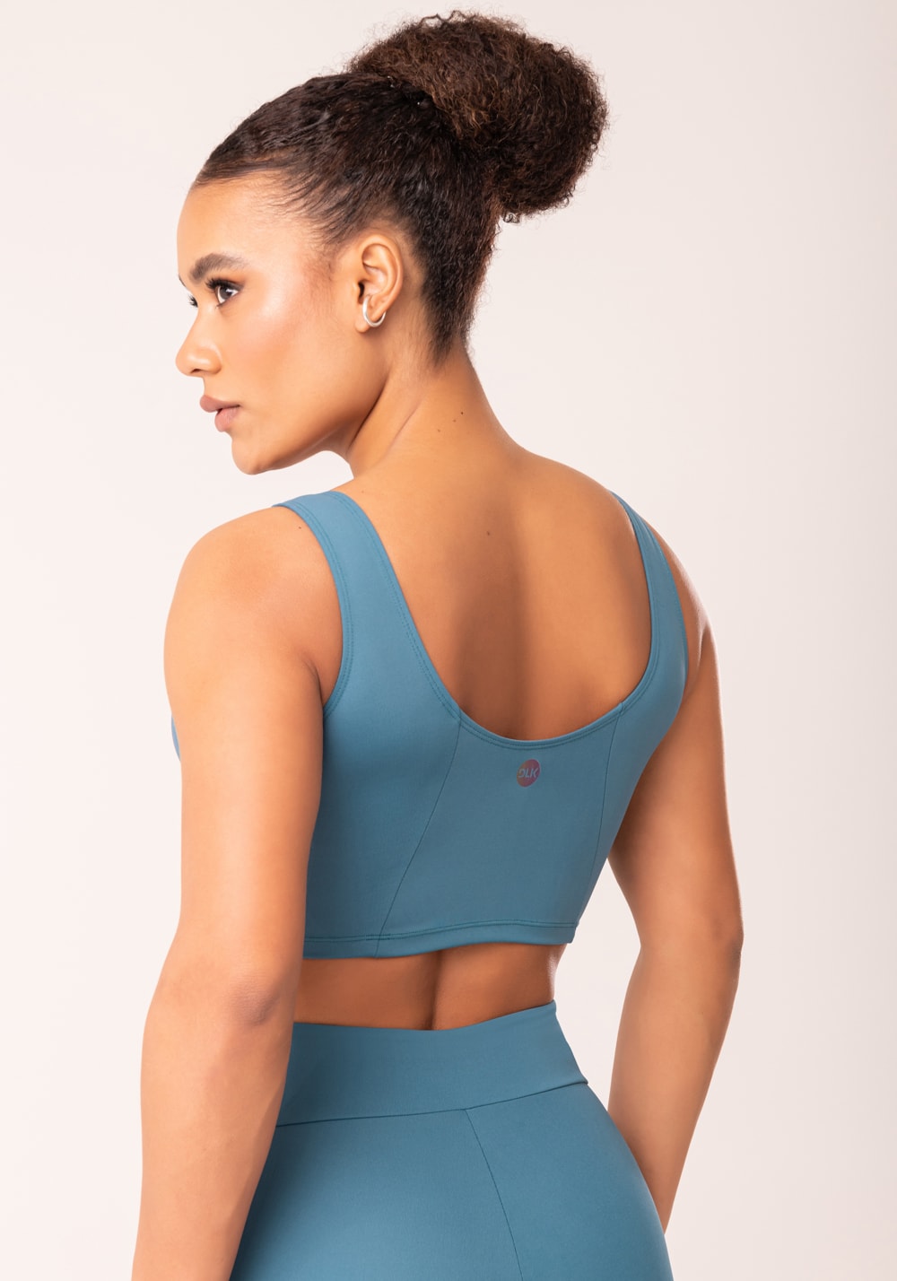 Top cropped fitness feminino azul com recortes oasis