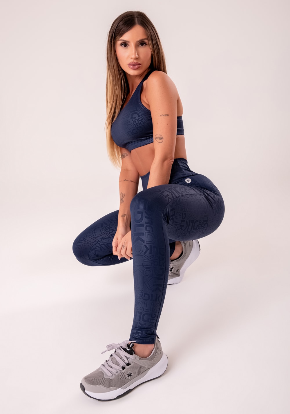 Legging fitness feminina azul marinho logomania reflections