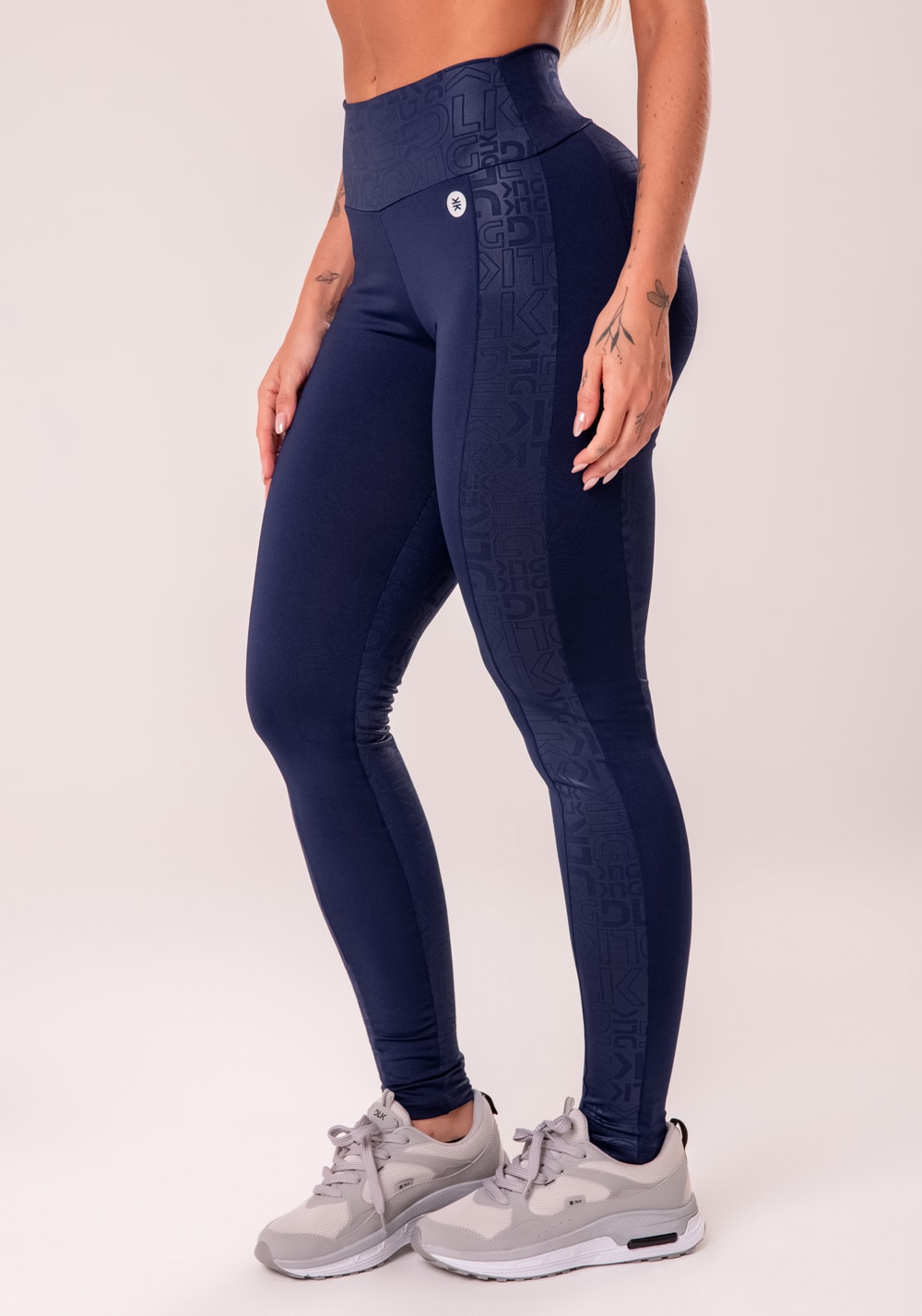 Legging fitness feminina azul marinho com recortes logomania reflections