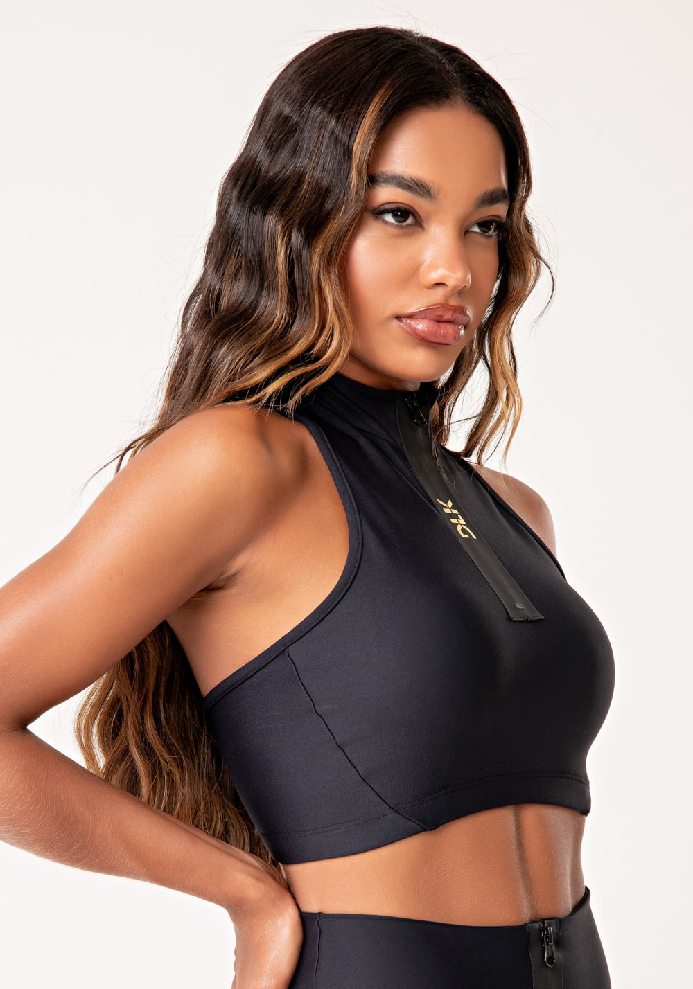 Top fitness feminino preto com zíper emborrachado lush