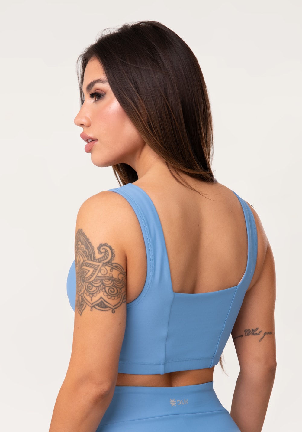 Top fitness feminino azul decote reto com recortes aura