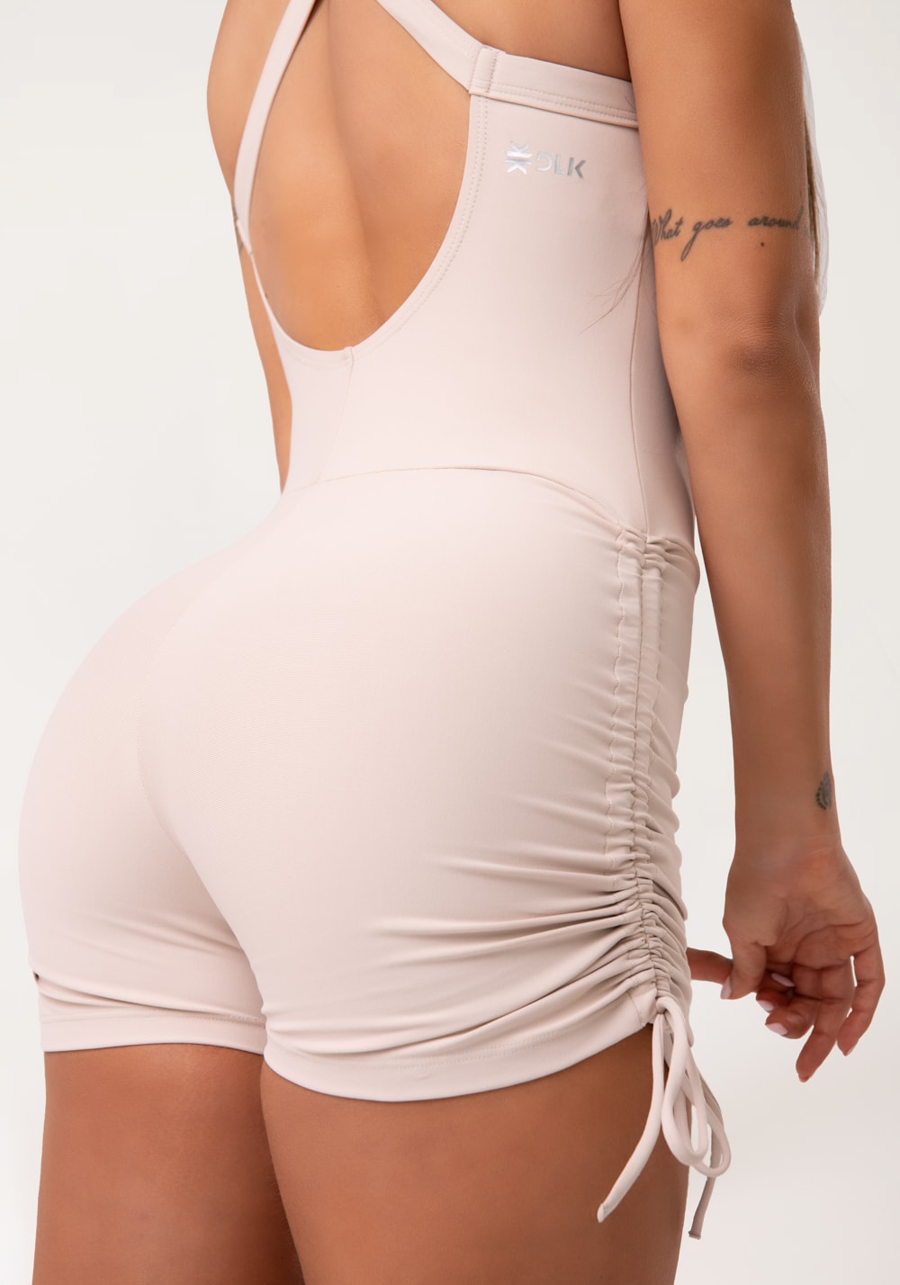 Macaquinho fitness feminino nude com franzido aura