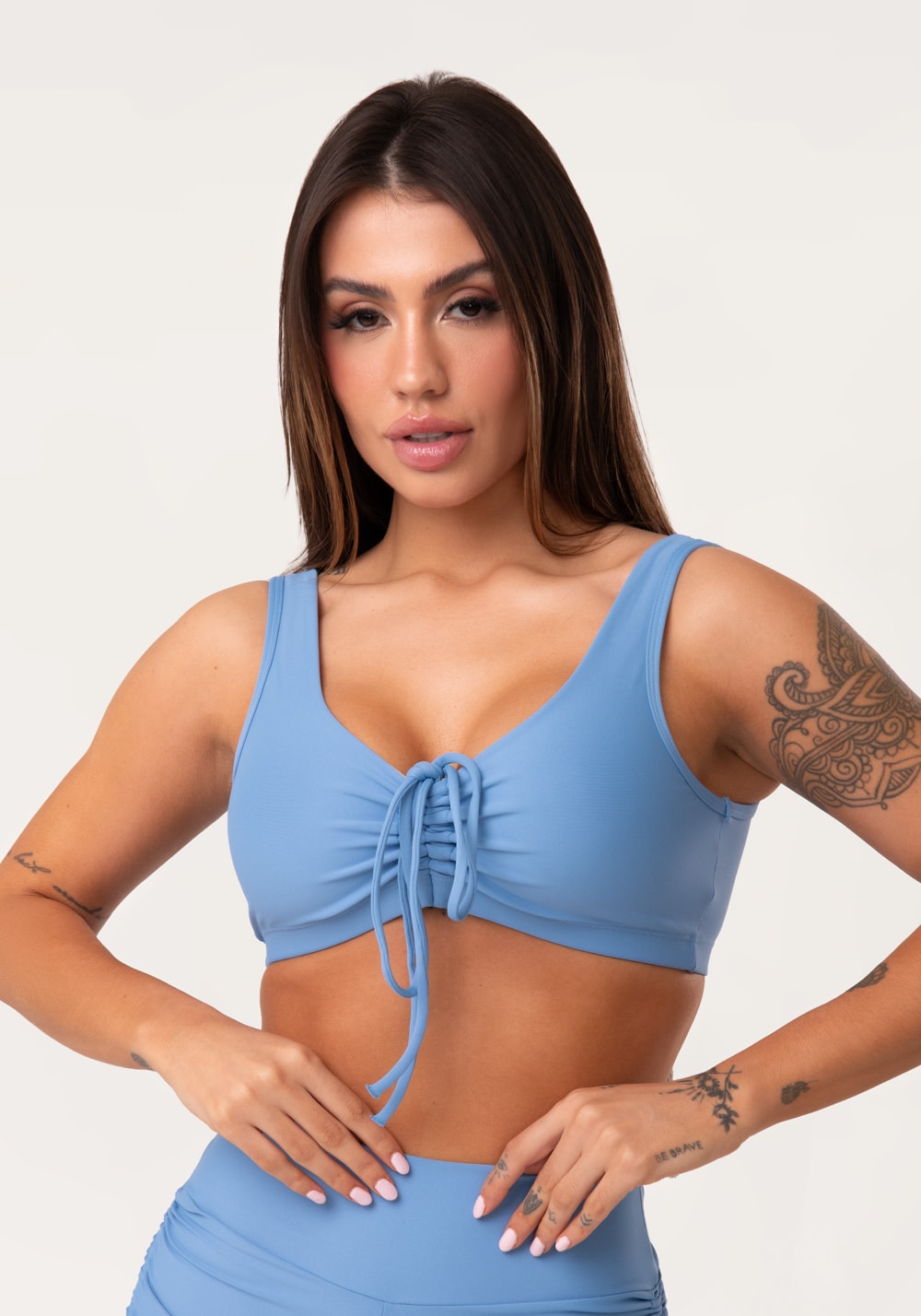 Top fitness feminino azul com franzido e amarração aura