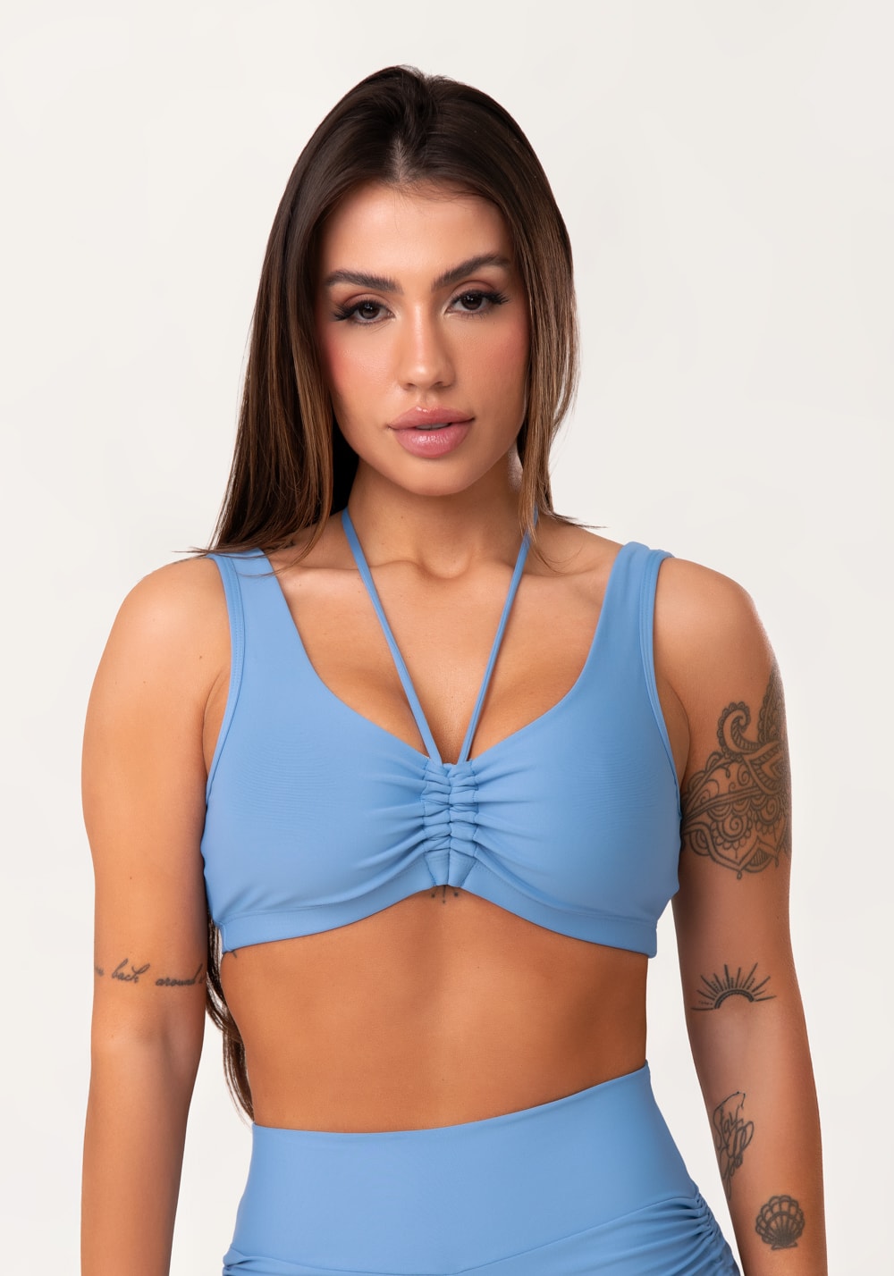Top fitness feminino azul com franzido e amarração aura