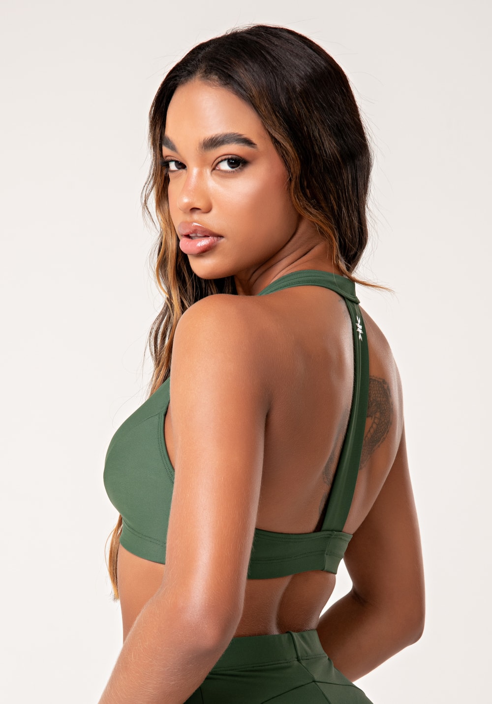 Top fitness feminino verde com decote v transpassado lush