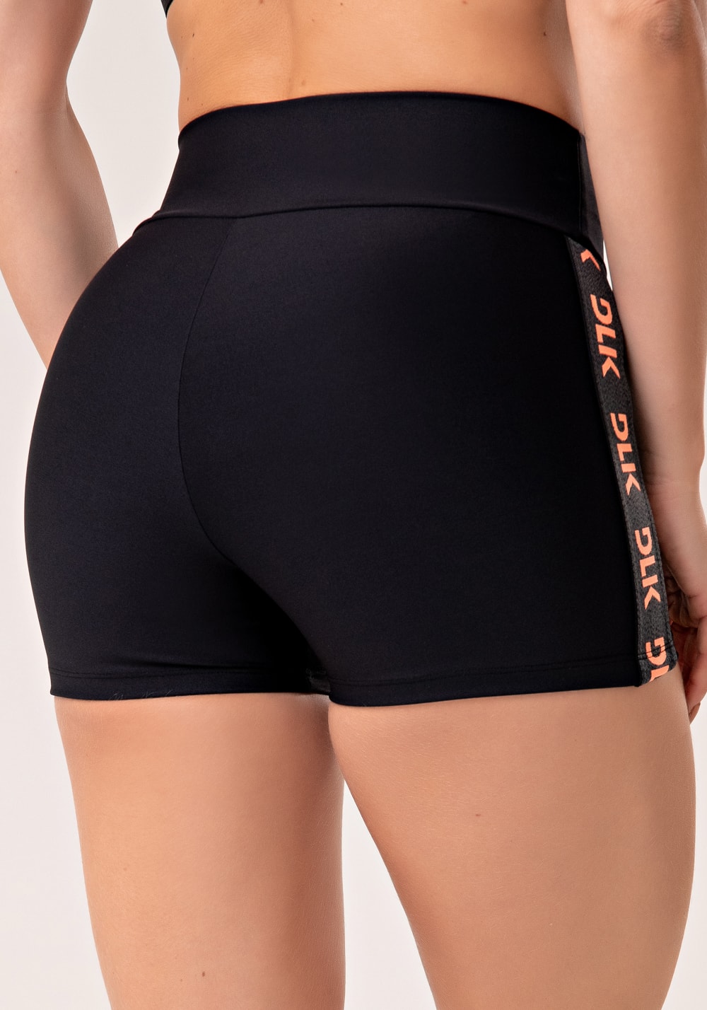 Short fitness feminino preto com elástico lateral laranja energy